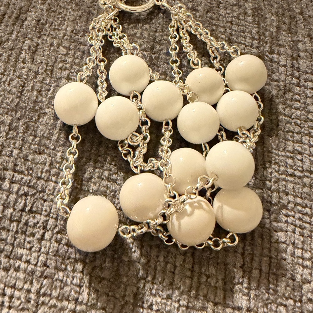 Multilayered Silver And White Beaded Bracelet - image 5